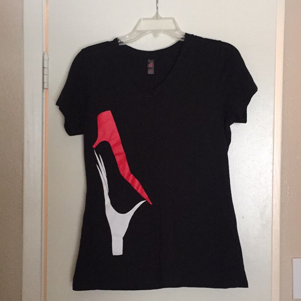 V neck black t’shirt.